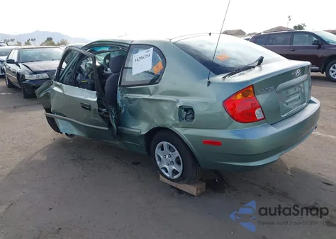 2004 Hyundai Accent Gl/Gt z USA, uszkodzony, nr VIN KMHCG35C34U279175